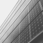 close-up photography of black and gray concrete building